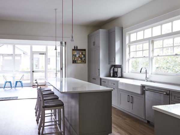Grey Island with White Countertop & Farmhouse Sink