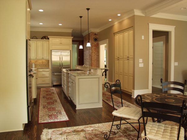 Granite Island Countertop & Cream Cabinetry