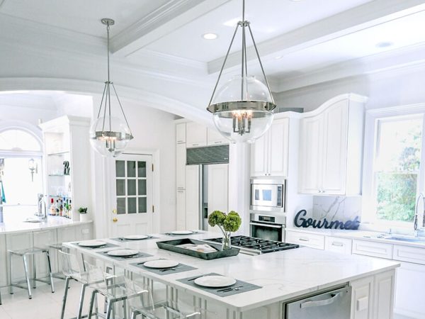 White Marble Island & Countertops in a Gourmet Kitchen