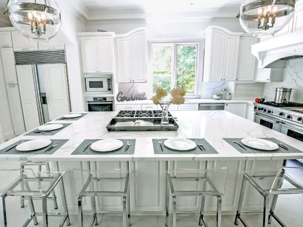 White Marble Island in a Bright Gourmet Kitchen