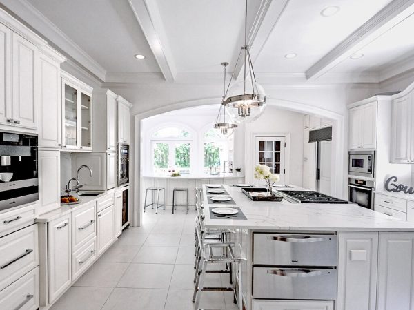 Custom White Kitchen with Marble Countertops