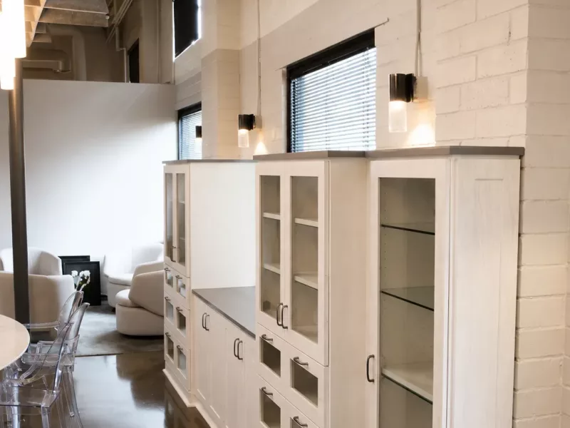 Custom storage drawers with glass fronts built by Top South
